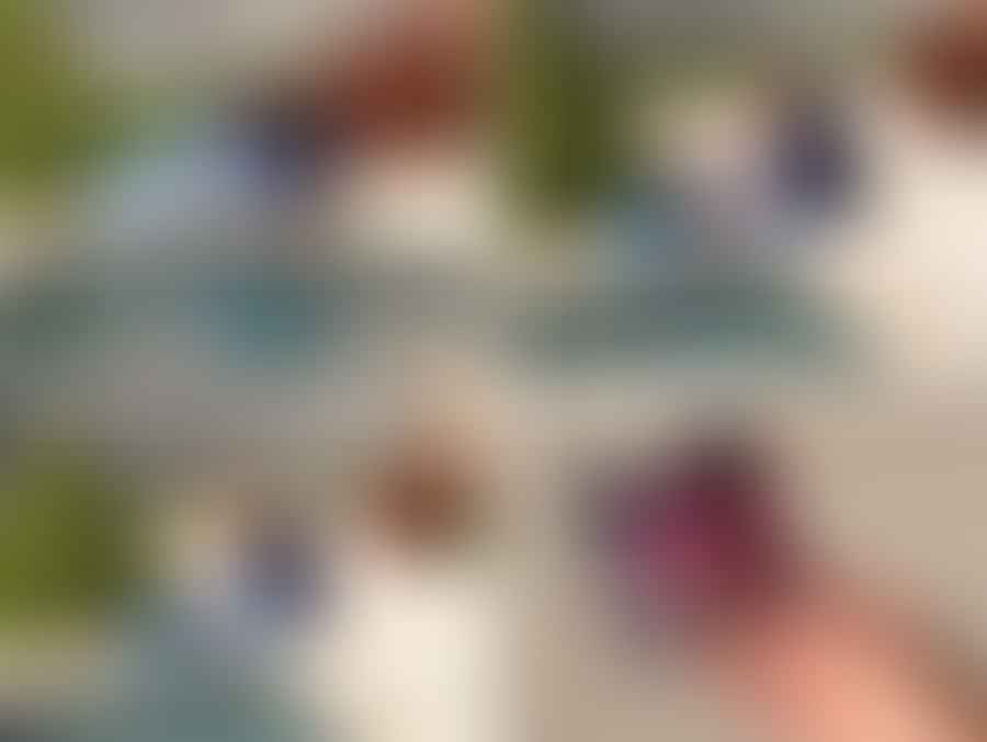 A pool owner testing water quality